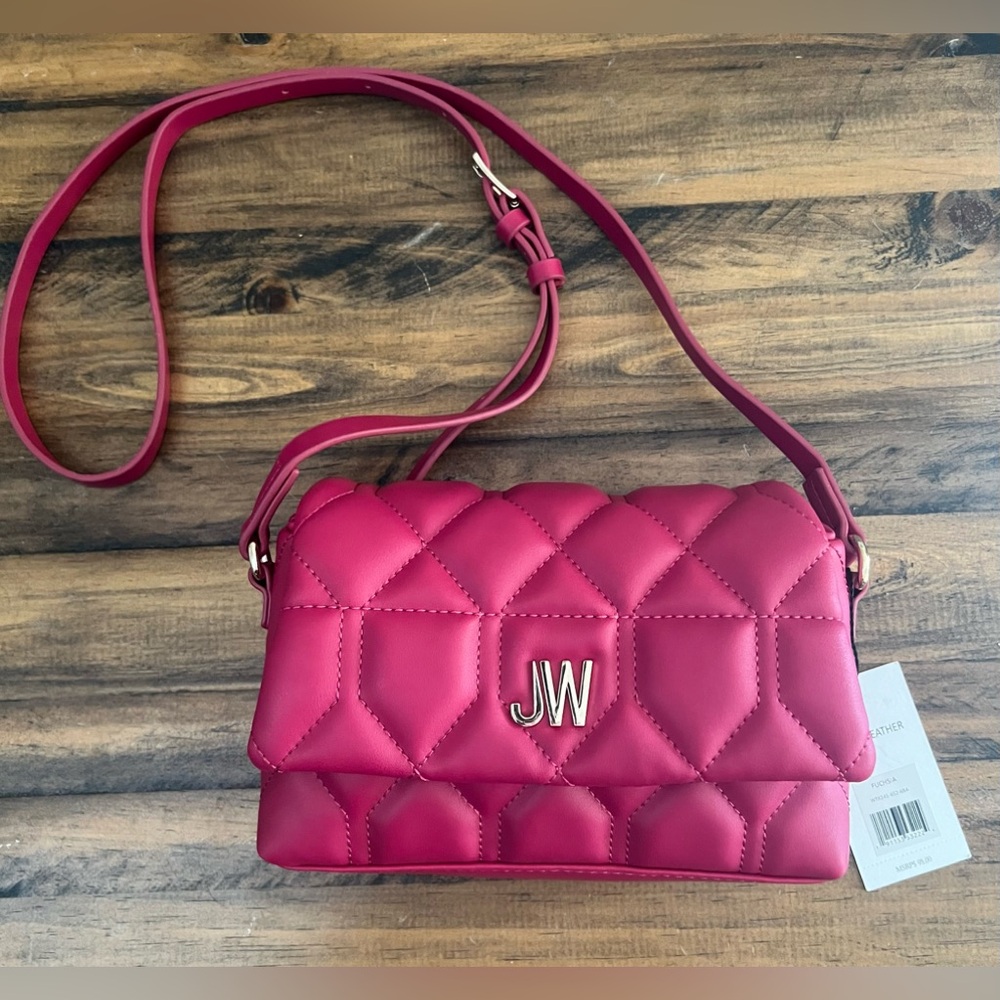 Jason Wu Crossbody NWT
Vegan leather - Fuchsia with color gold hardware